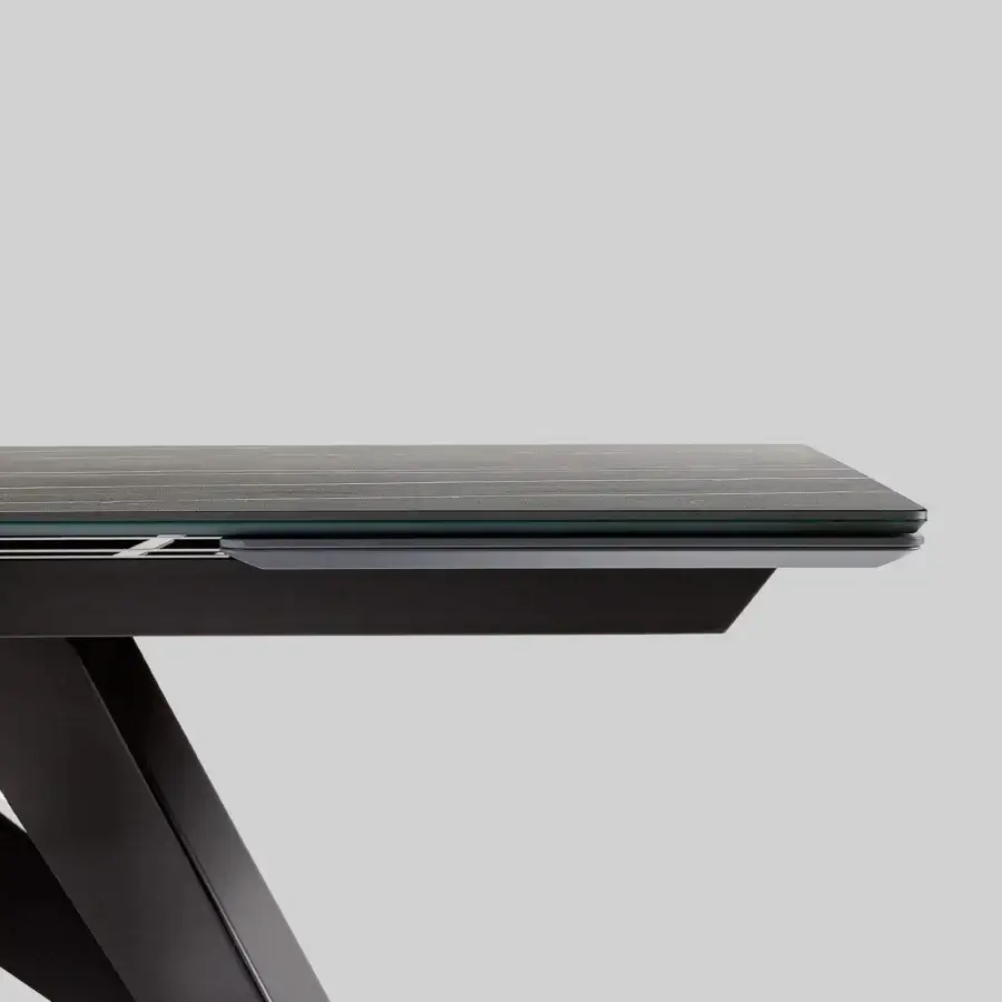 Exceptional Bonaldo Big extendable table with glossy gray glass top and dark metal legs in geometric configuration