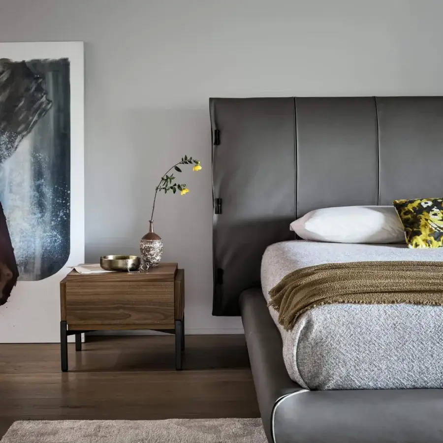 Superior Bonaldo Cuff bed with tailored details, vertical pleating and sleek gray synthetic fabric upholstery with a matte finish