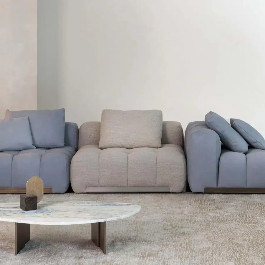 Superior Rugiano Yacht sectional with cool bluish-gray and light beige textile upholstery and refined metal details