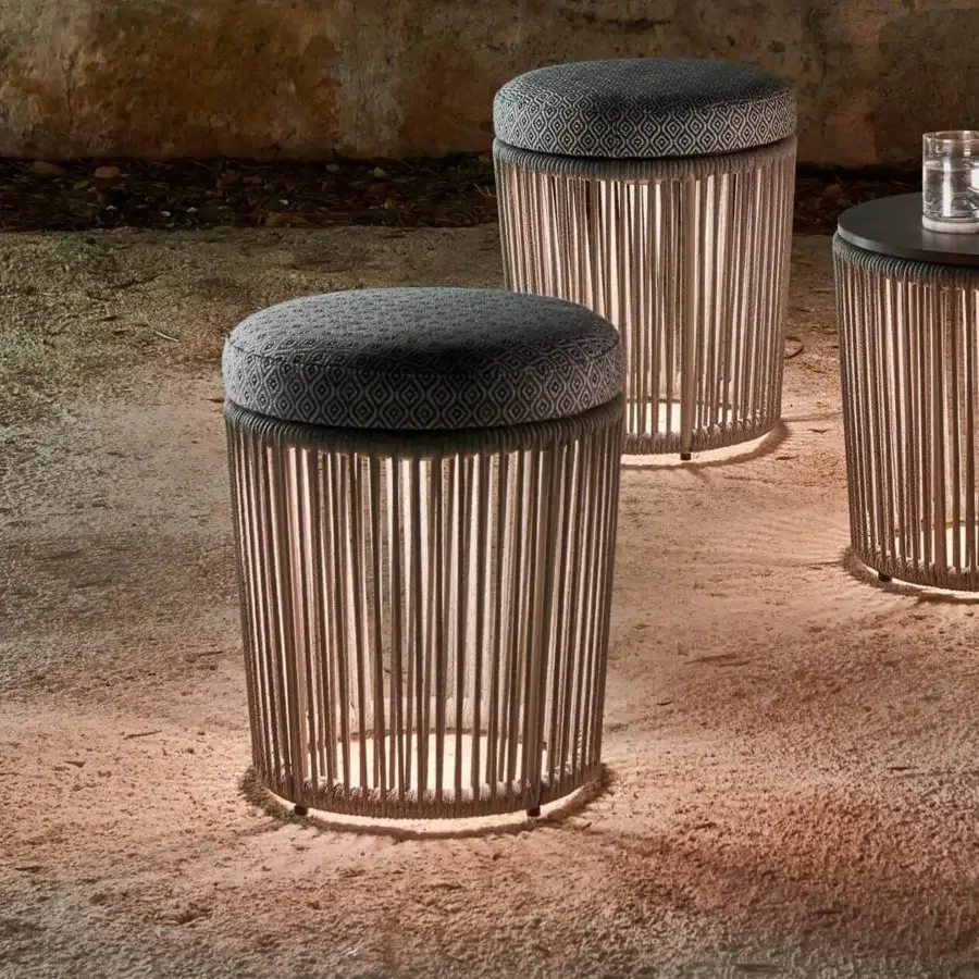 Exceptional Varaschin Tibidabo ottoman with dark gray patterned textile and brownish-gray woven synthetic base, built with powder-coated aluminum