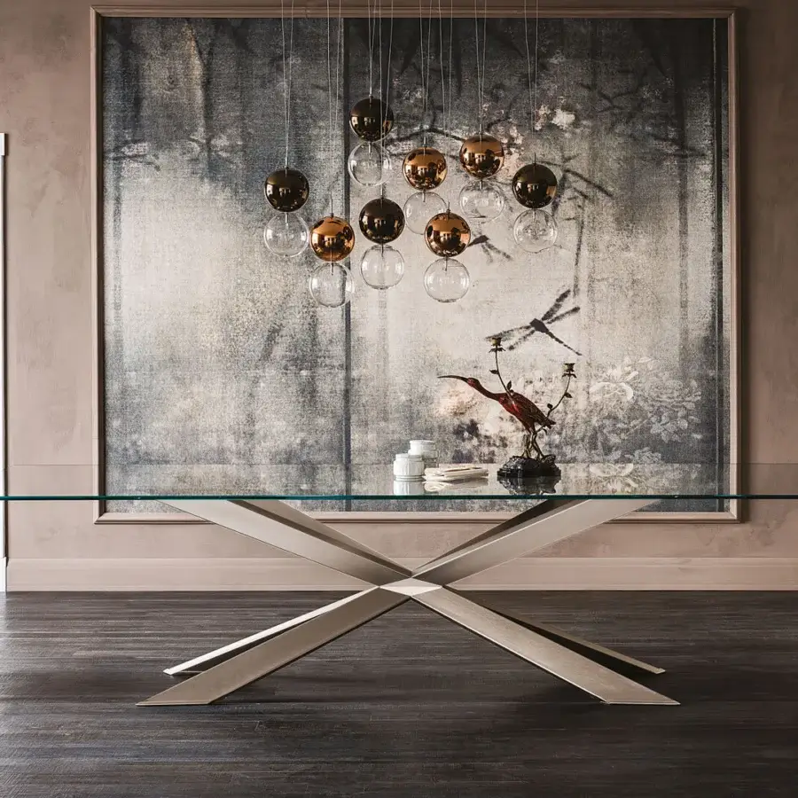 Remarkable Cattelan Italia Spyder table with rectangular clear glass top and satin titanium painted steel base