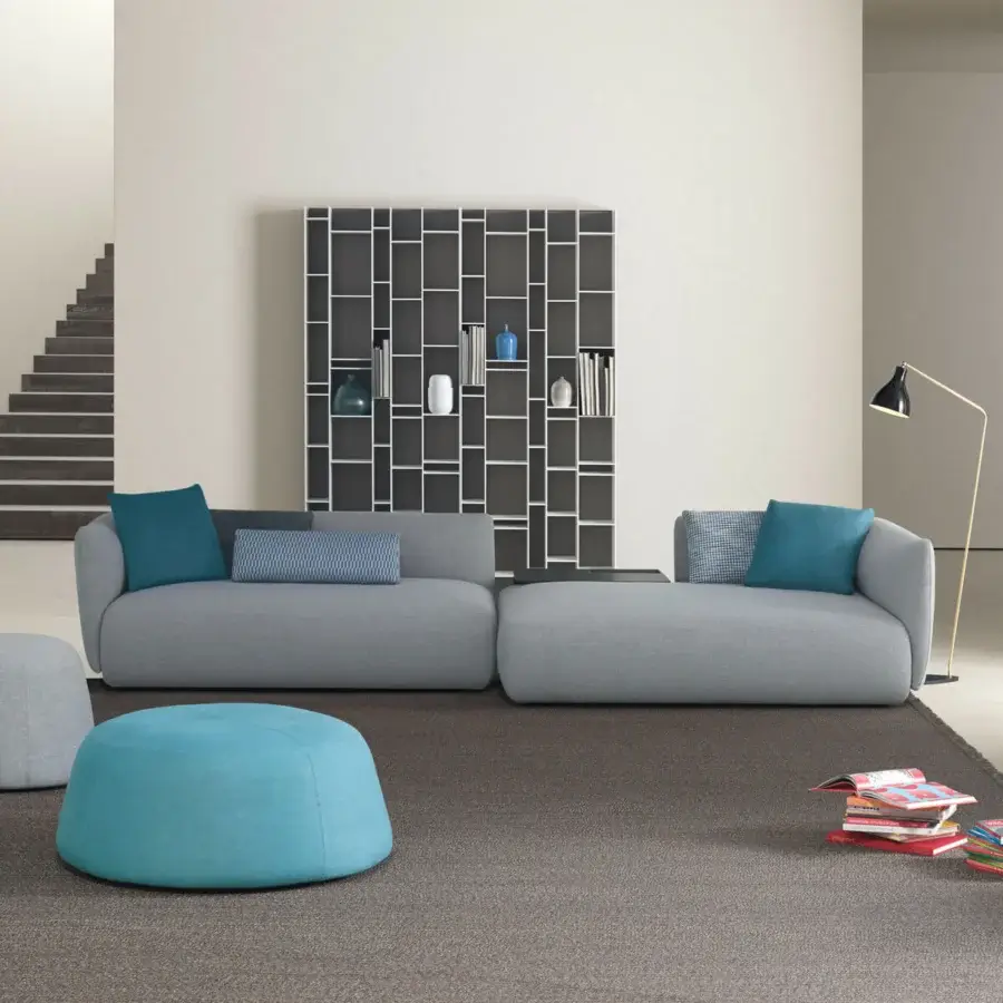 Exceptional MDF Italia Cosy sectional with soft gray textile upholstery and inviting teal cushions built with a solid wood frame