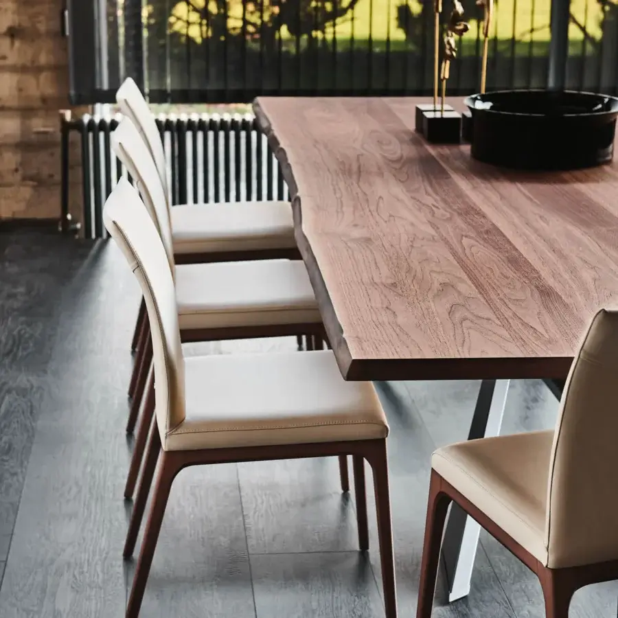 Distinguished Cattelan Italia Spyder Wood table with Canaletto walnut top and graphite painted steel base crafted with a unique live edge finish