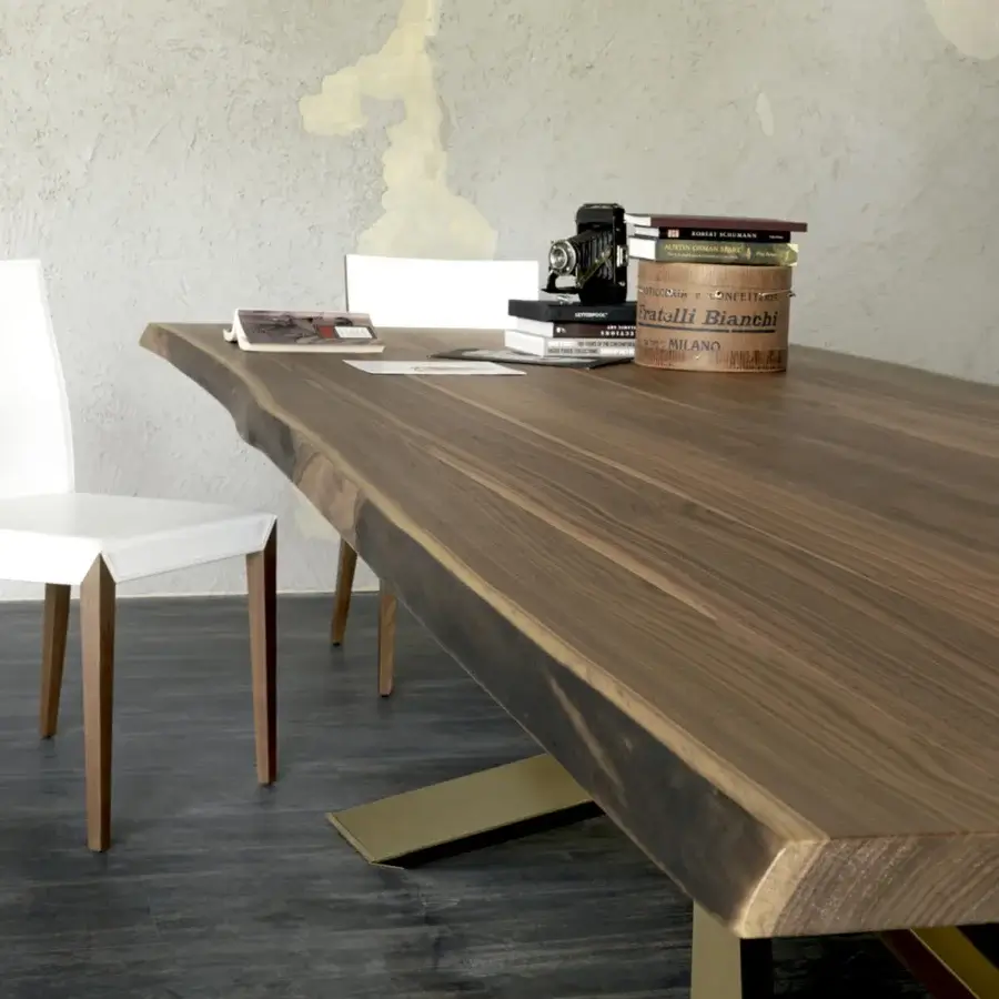 Lavish Cattelan Italia Spyder Wood table built with a Canaletto walnut top and satin bronze painted steel base in a matte finish