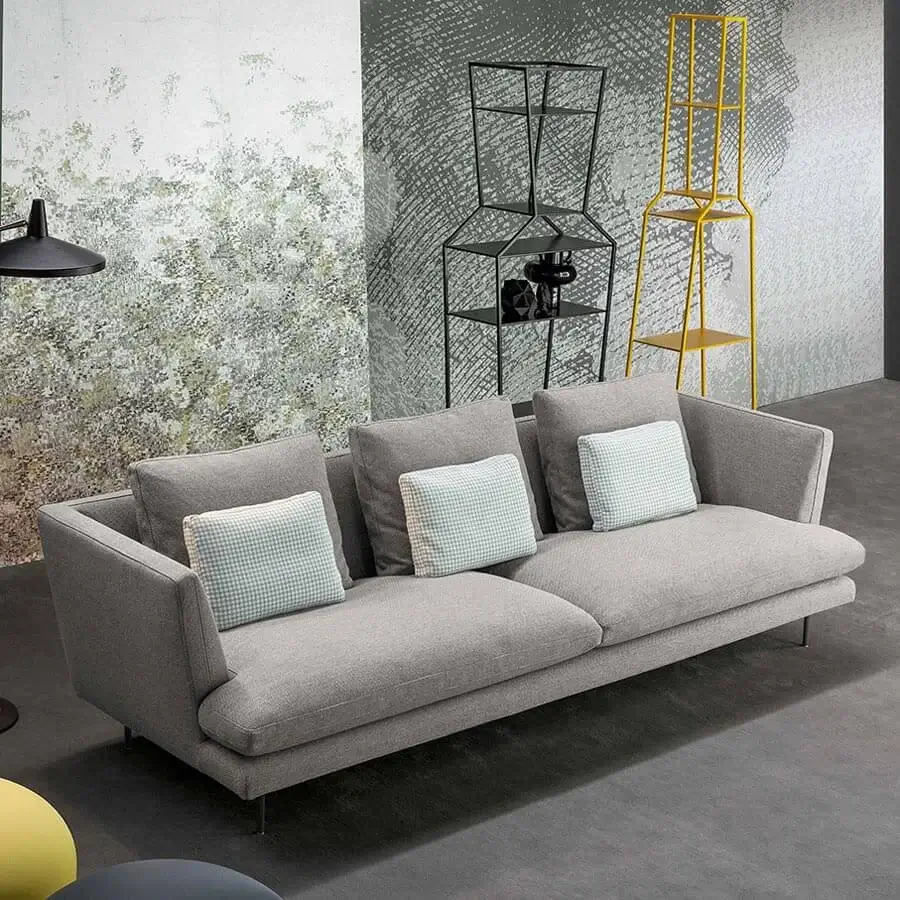 Sophisticated Bonaldo Lars sofa with geometric silhouette and wide cushions in gray textile with matte finish