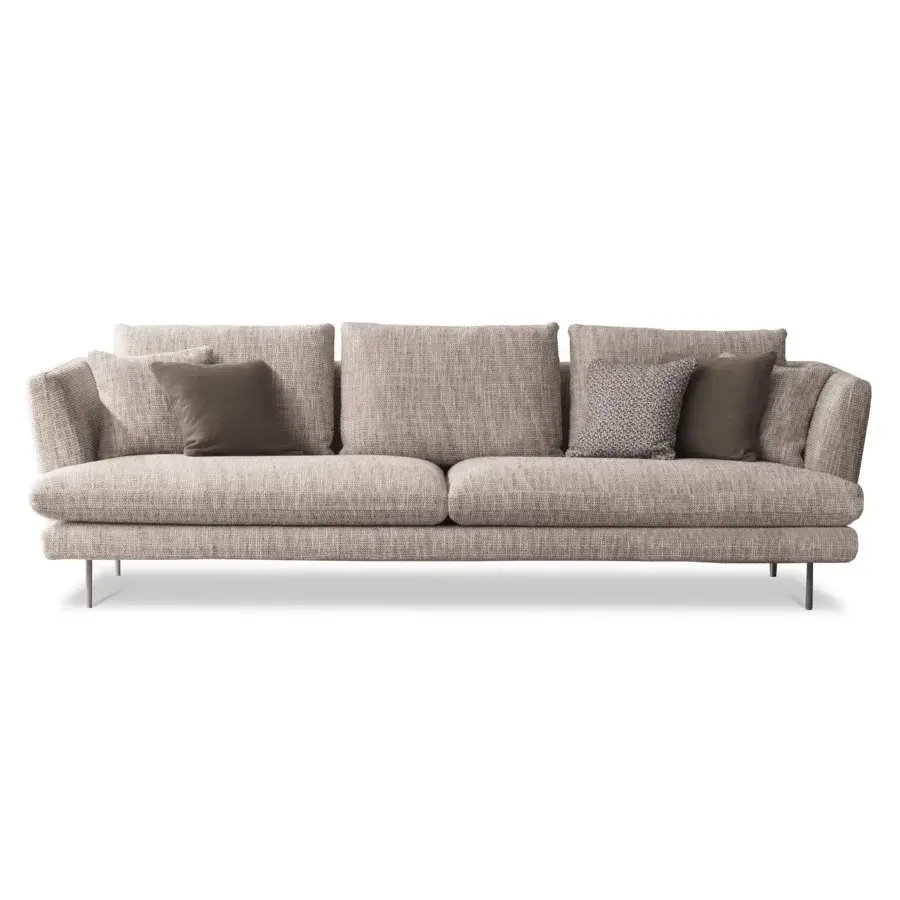 Lavish Bonaldo Lars sofa with light beige textured textile upholstery and slender metal legs including plush cushions and brown throw pillows