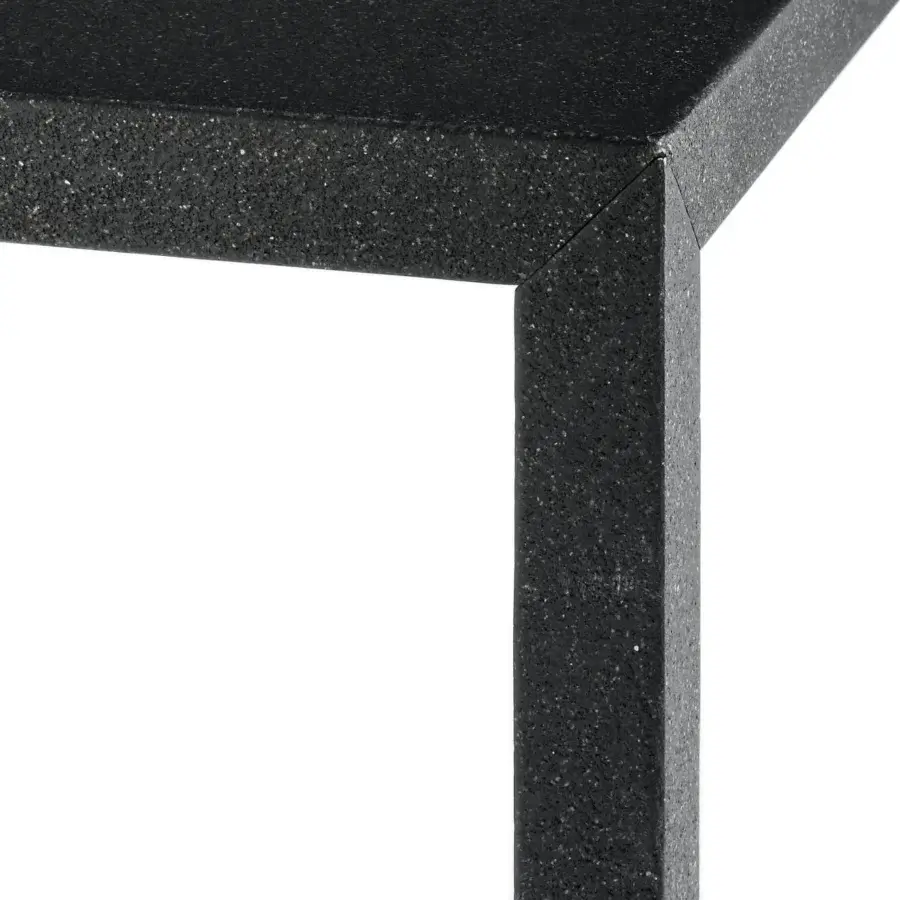 Distinguished MDF Italia Tense Material table with dark speckled composite and matt brushed finish under transparent acrylic
