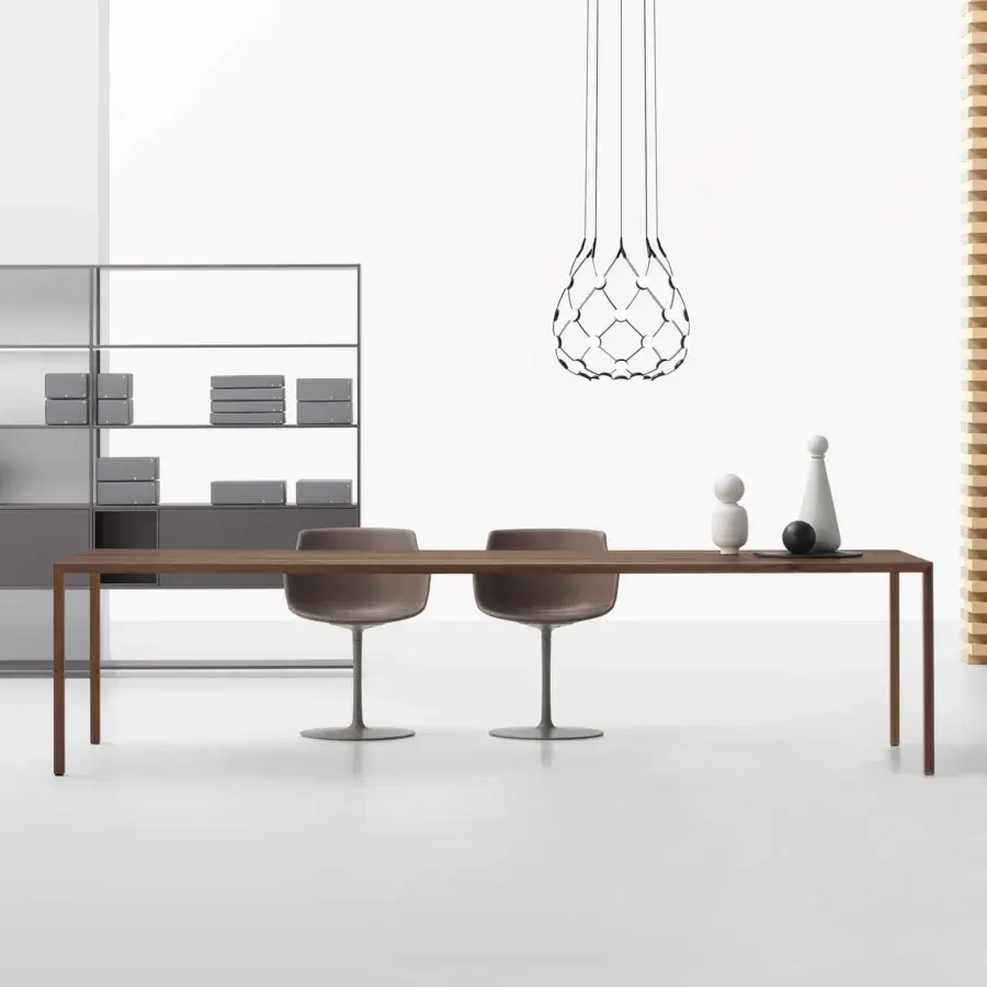 Distinguished MDF Italia Tense conference table in medium brown wood with a matte finish and innovative tensioning components