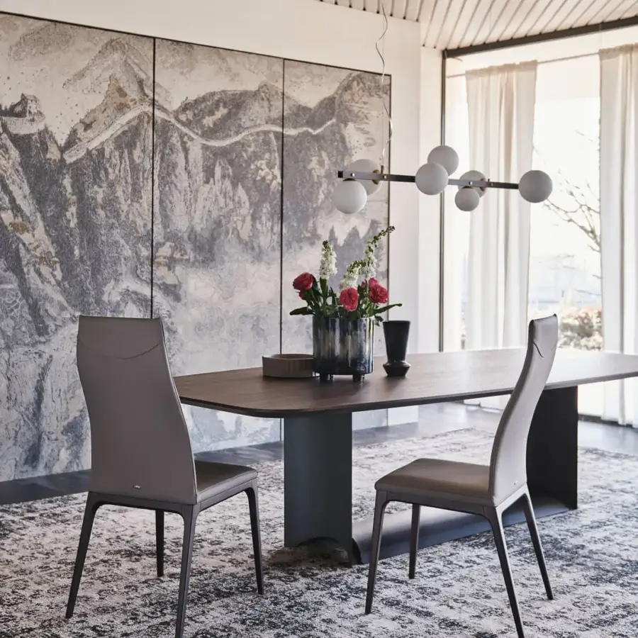 Elegant Cattelan Italia Dragon table with boat-shaped Canaletto walnut top and graphite embossed lacquered steel base
