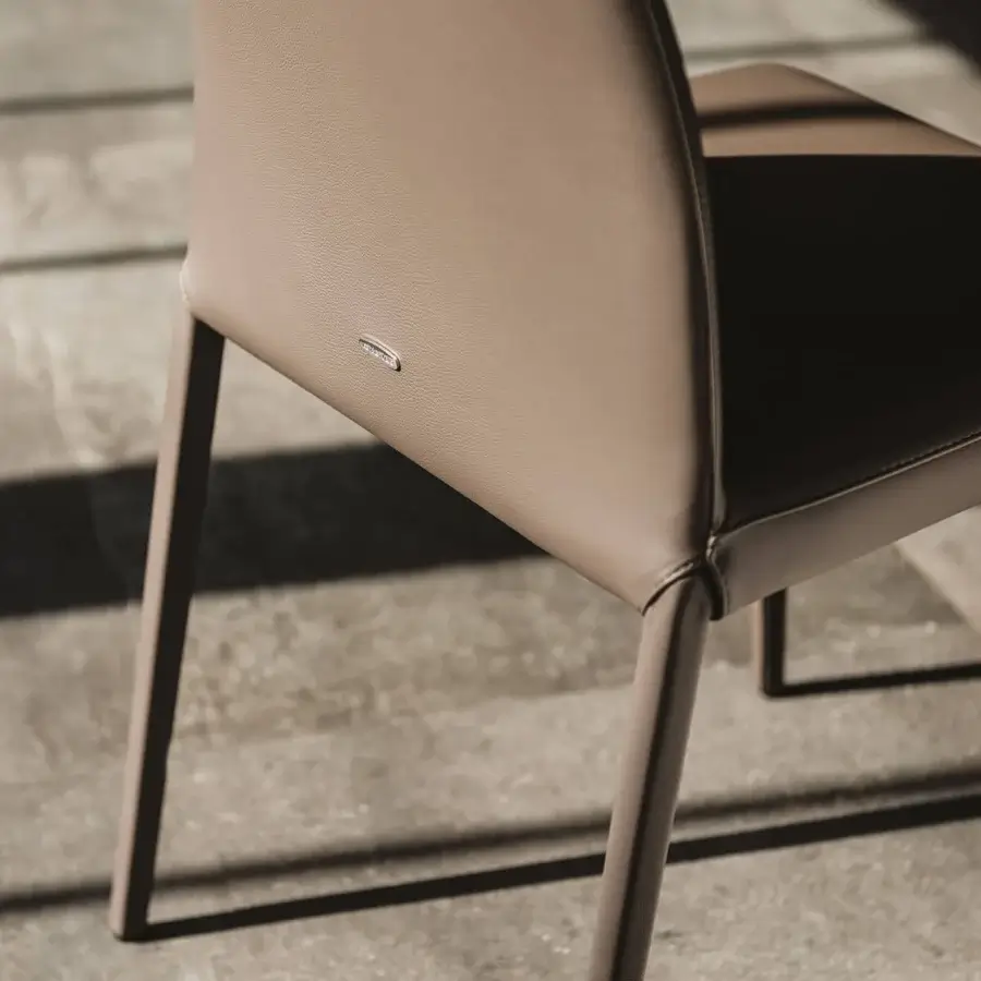 Superior Cattelan Italia Norma chair upholstered in supple light brown soft leather with matching finish legs