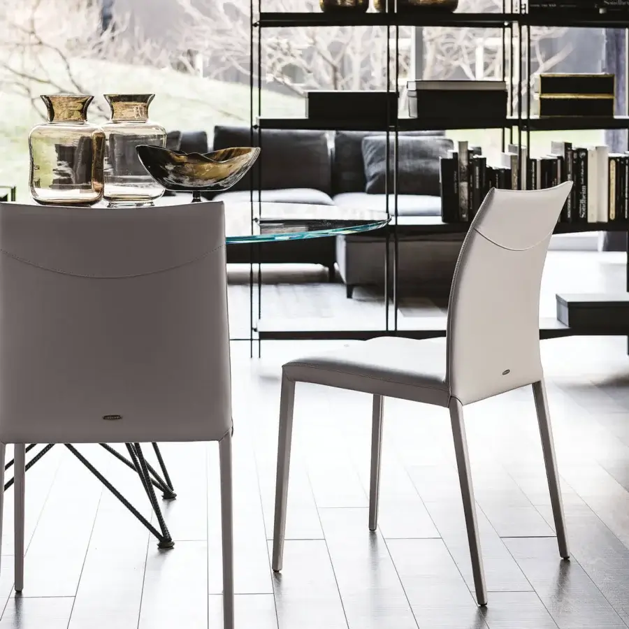 Superior Cattelan Italia Norma chair in light gray synthetic leather with a matte finish and slim metal legs
