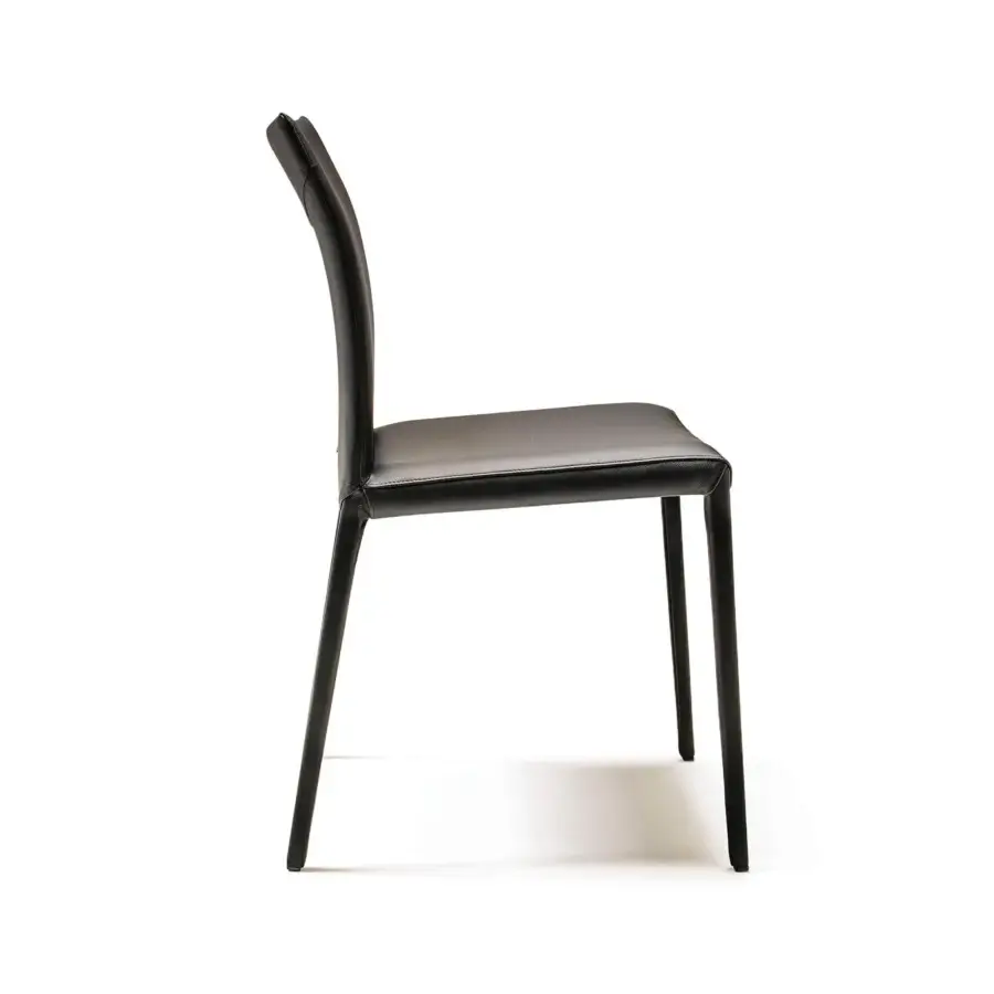 Distinguished Cattelan Italia Norma chair in black soft leather with a sleek steel frame and curved backrest