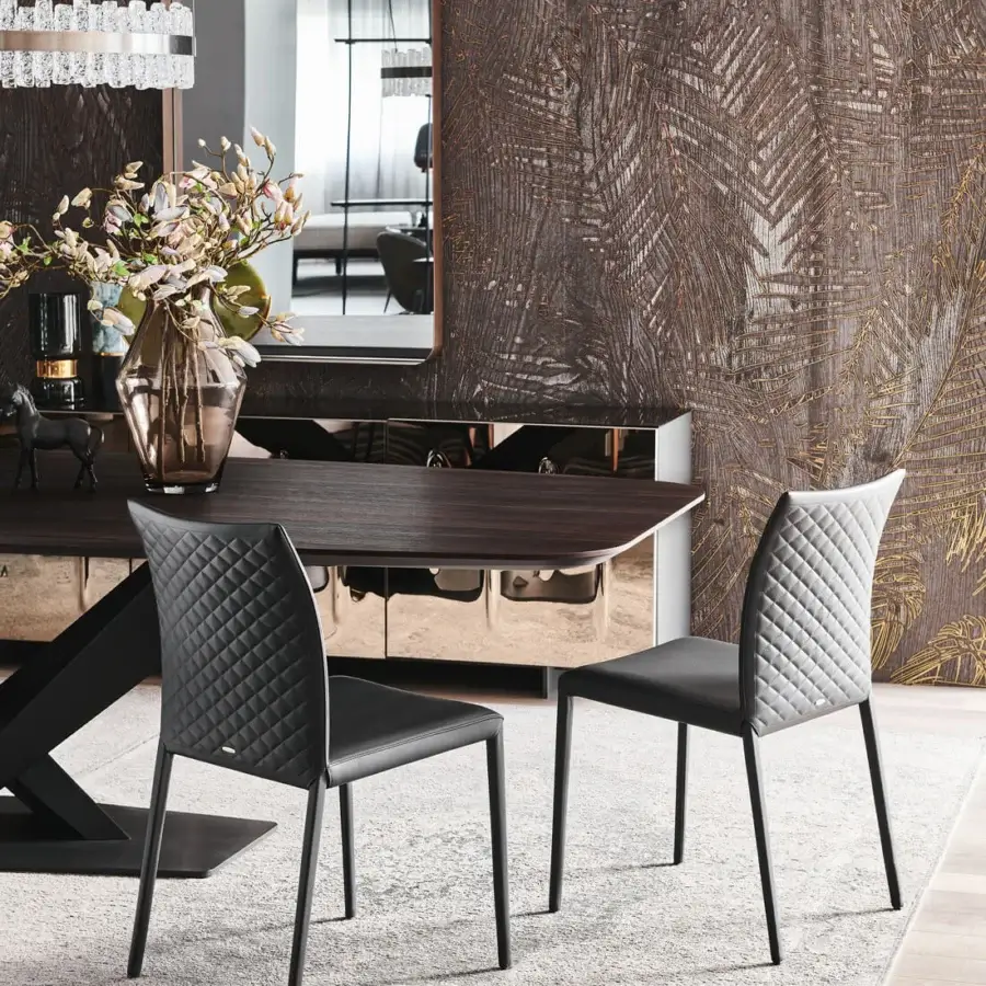 Distinguished Cattelan Italia Norma chair with dark gray synthetic leather and quilted seatback, built with matte metal legs