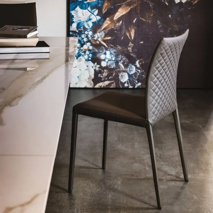 Superior Cattelan Italia Norma chair with supple soft brown leather and quilted seatback with dark brown steel finish