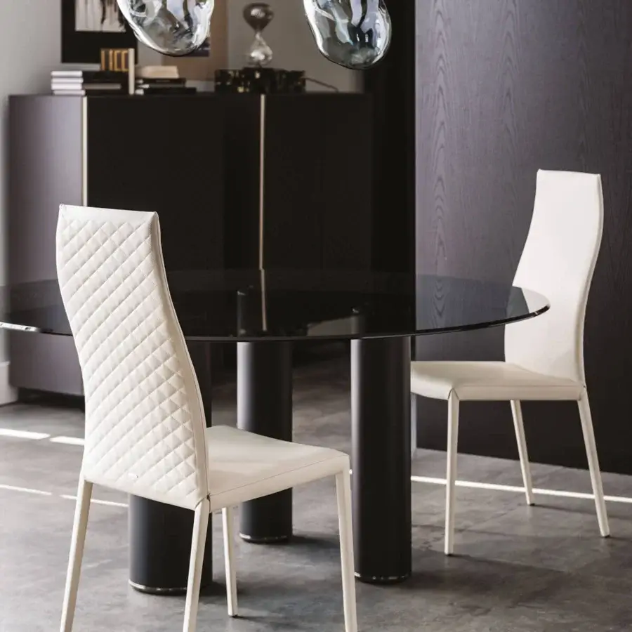 Elegant Cattelan Italia Norma Couture chair in white synthetic leather with quilted diamond pattern and white steel frame