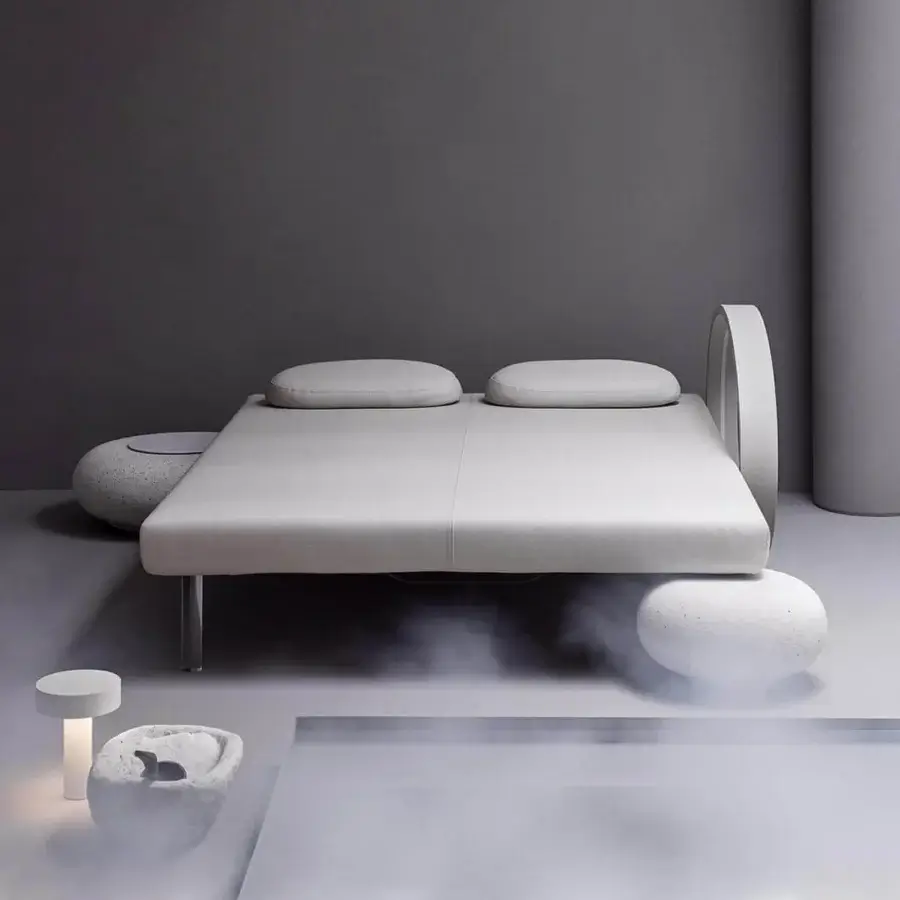 Distinguished Varaschin Wellness Therapy bed with light gray textile frame and sleek metal legs built for holistic sensoriality