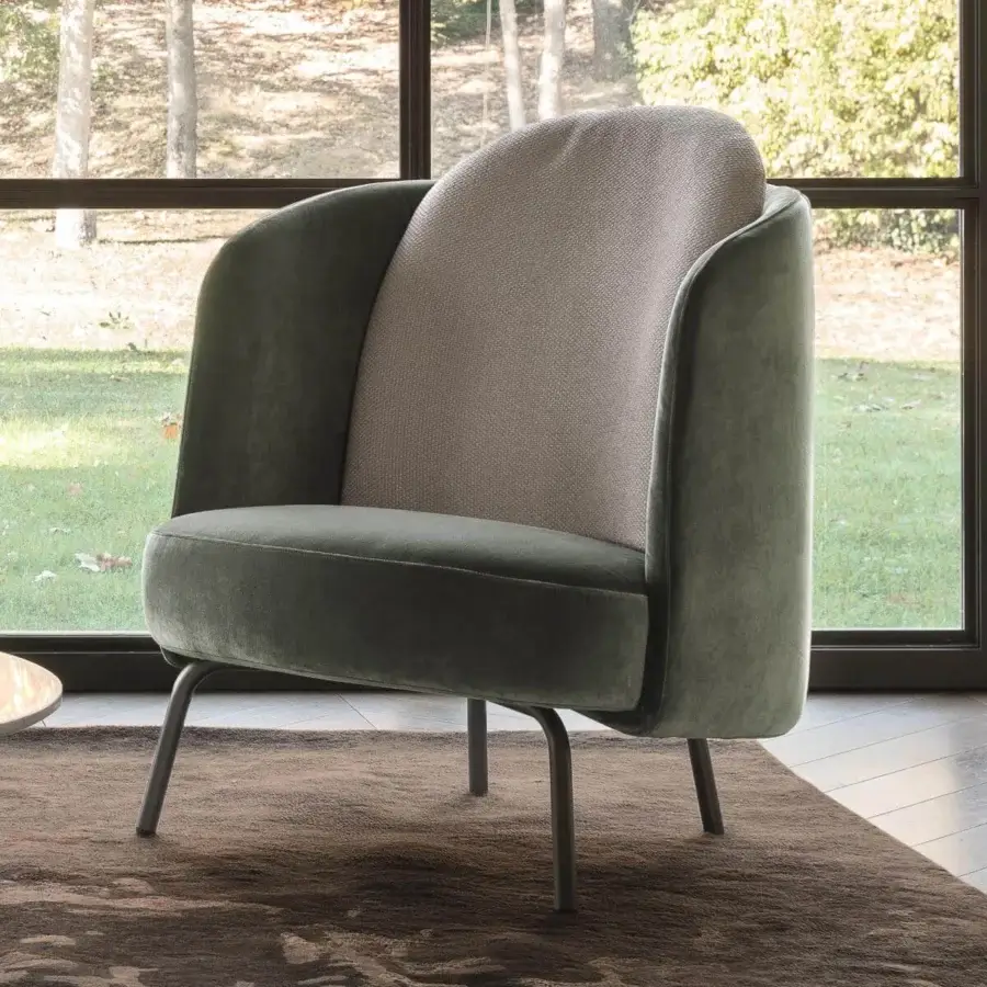Elegant Ditre Italia Lucia lounge chair with muted green velvety textile and woven light beige backrest with dark metal legs