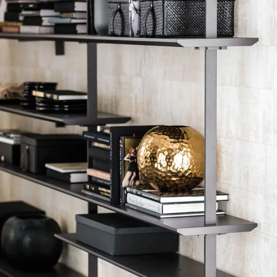 Innovative Cattelan Italia Airport bookcase with staggered shelves in embossed graphite painted wood and graphite embossed lacquered steel