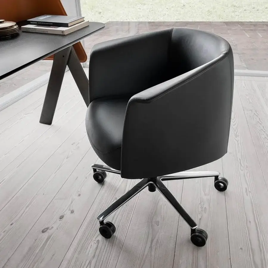 Exceptional Presotto Milo armchair with black synthetic leather and aluminum 5-point-star base on castors