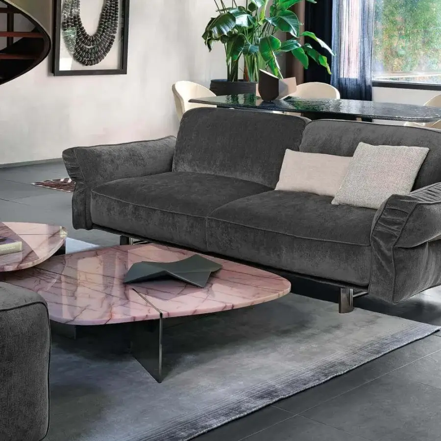 Distinguished Arketipo Rumors coffee table with pinkish swirling marble top and precise metallic blades crafted with a polished finish