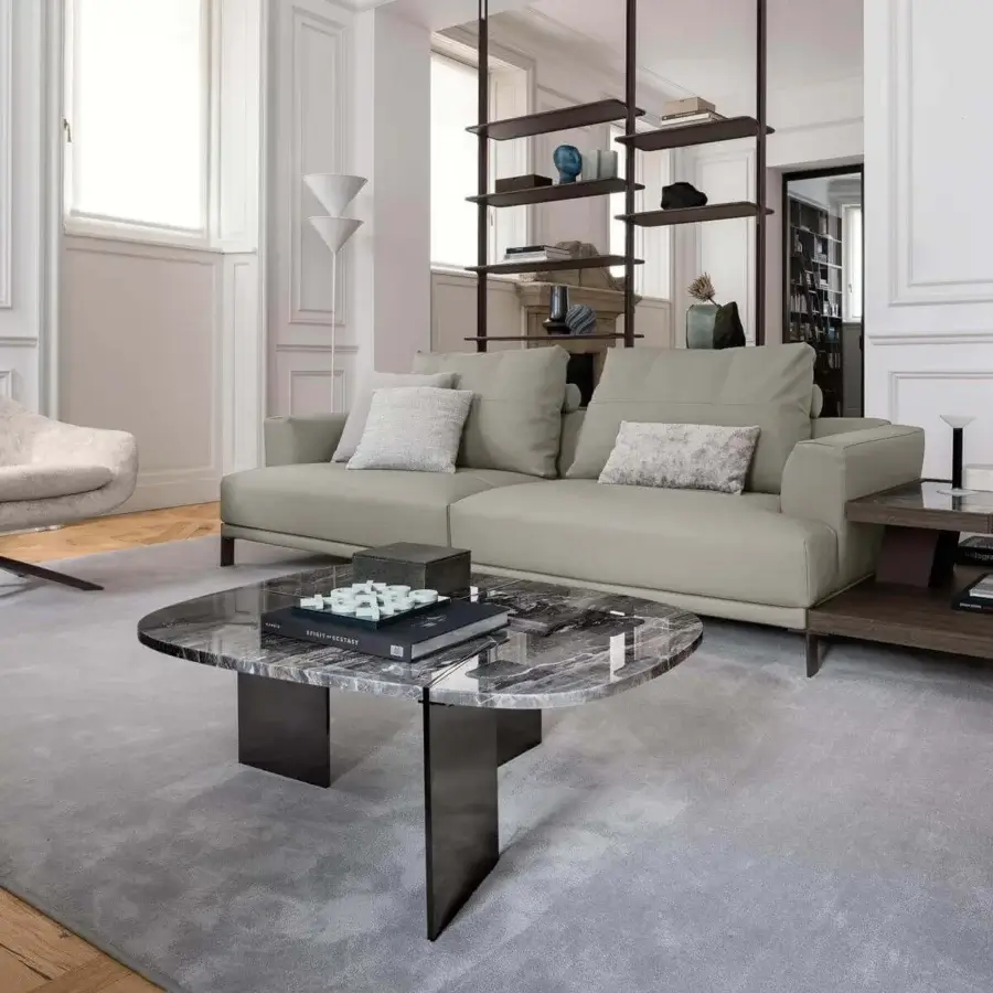 Exceptional Arketipo Rumors coffee table crafted with a curvaceous variegated marble top and intersecting matte dark metal blades