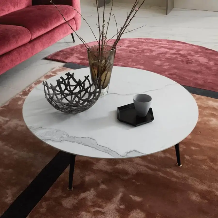 Elegant Presotto Olive coffee table with ceramic top exhibiting grey veining and peltro metal legs with brass feet