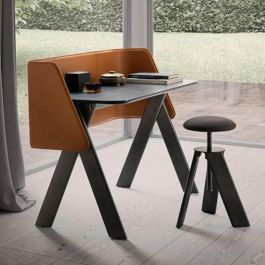 Distinguished Presotto Squid desk with angular lines and a dark matte top complemented by a black epoxy base and tan leather guard