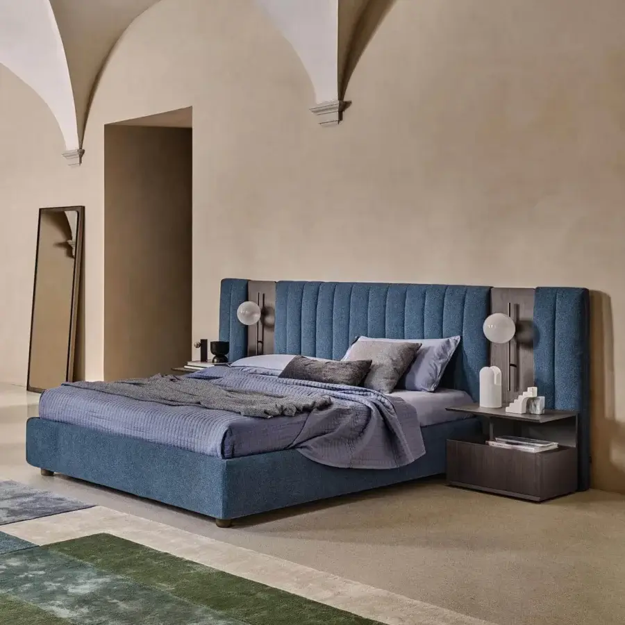 Distinguished Ditre Italia Otello bed with textured medium blue fabric and wood accents creating a modern minimalist design