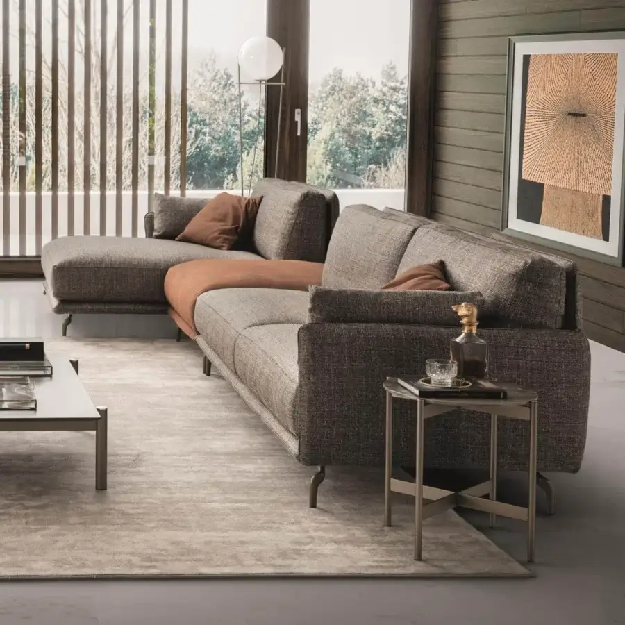 Distinguished Ditre Italia Krisby sectional with complex gray and brown textured textile, elevated by slender metallic legs with bronze finish