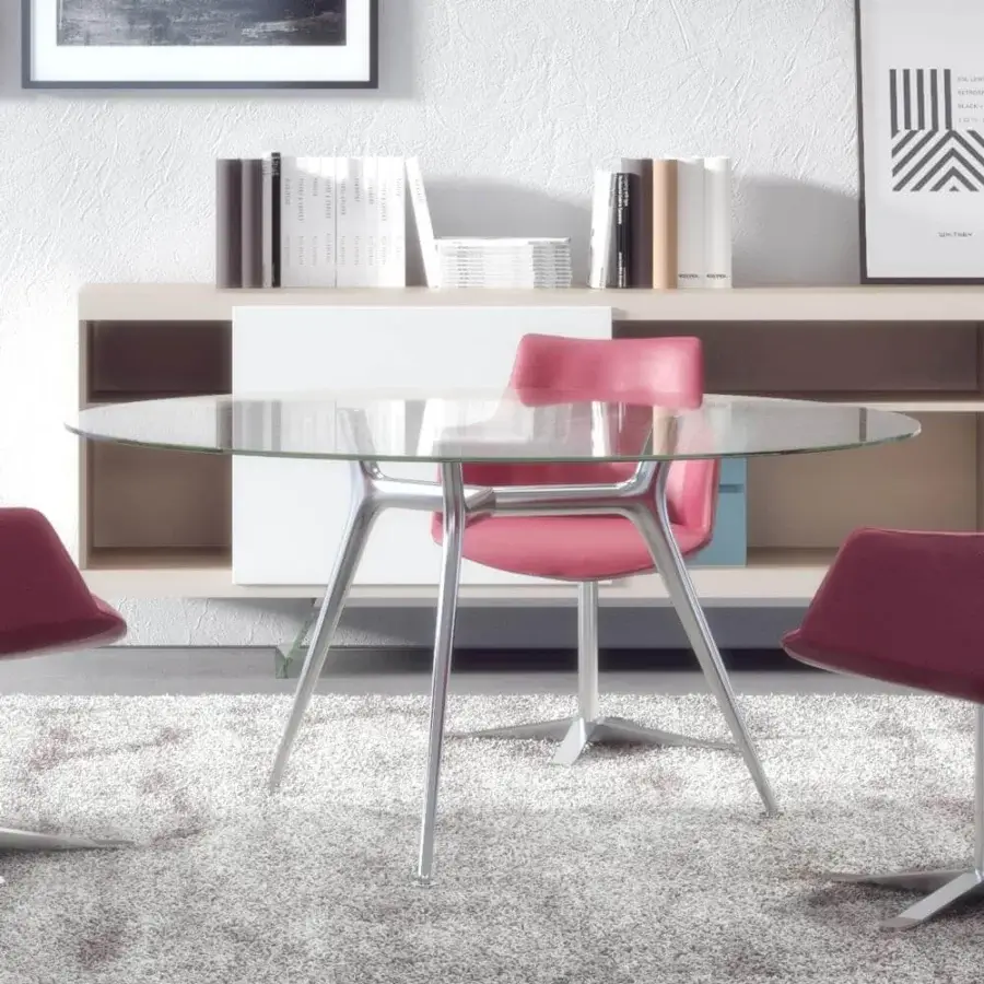 Elegant Presotto P016 table with transparent glass top and silver metal built with three aluminum legs