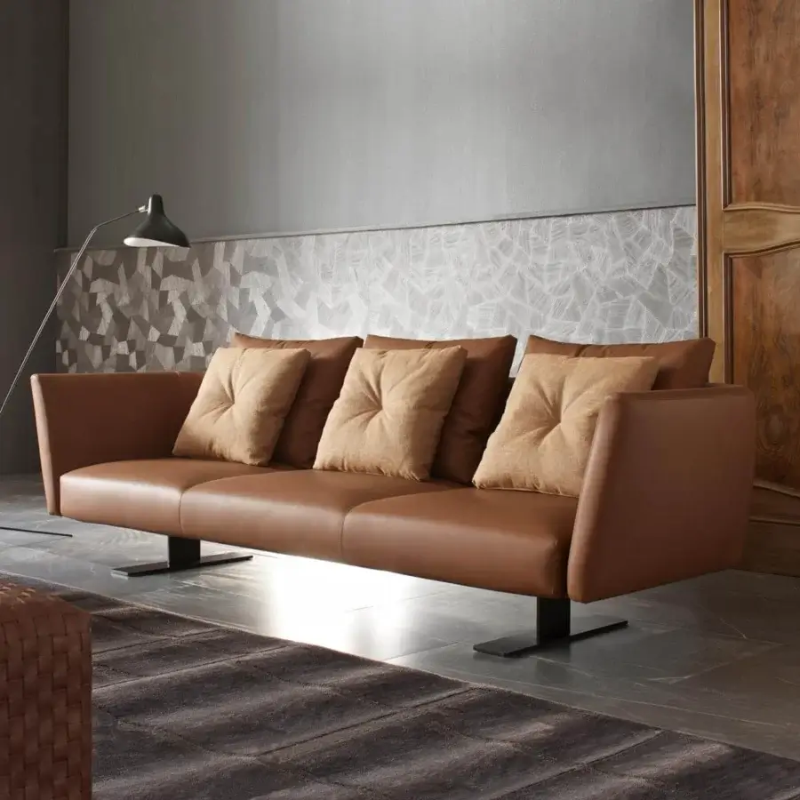 Exceptional Presotto Saint Barth sofa with warm brown leather upholstery and refined Peltro metal base