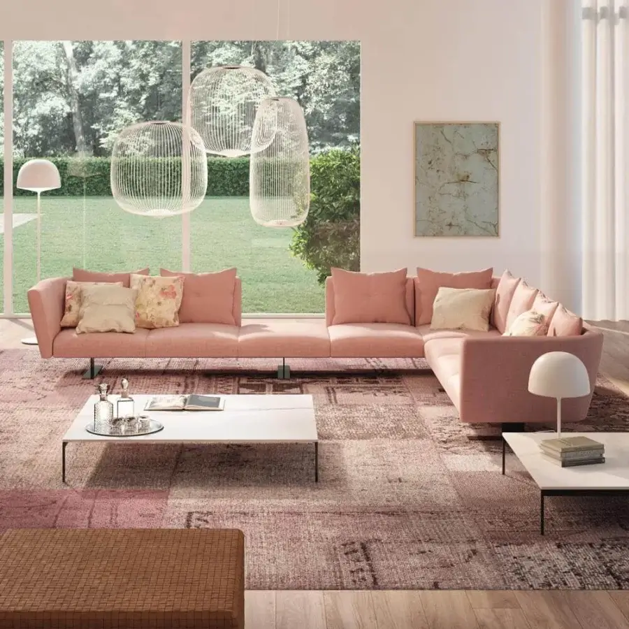 Distinguished Presotto Saint Barth sectional with muted pink textile upholstery and metal Peltro base, crafted with matt lacquered coffee tables
