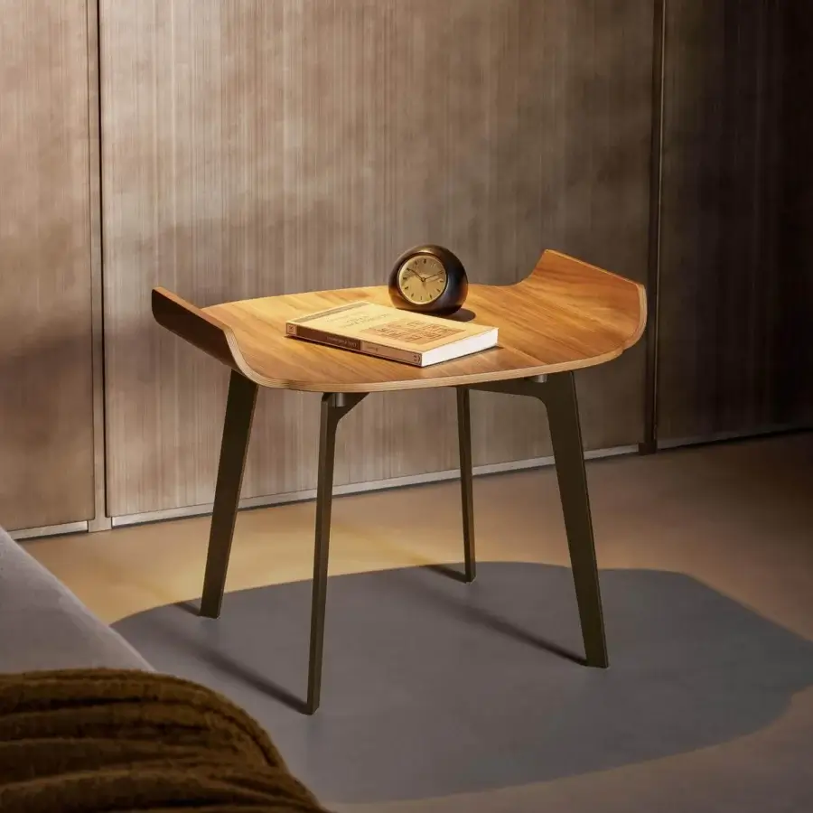 Elegant Bonaldo Olos nightstand with curved wood top and dark bronze finished metal legs