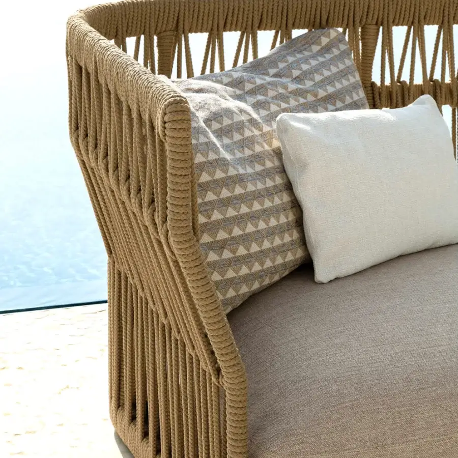 Innovative Talenti Cliff sectional with a curved silhouette crafted in textured matte tan rope and light brown weather-resistant fabrics
