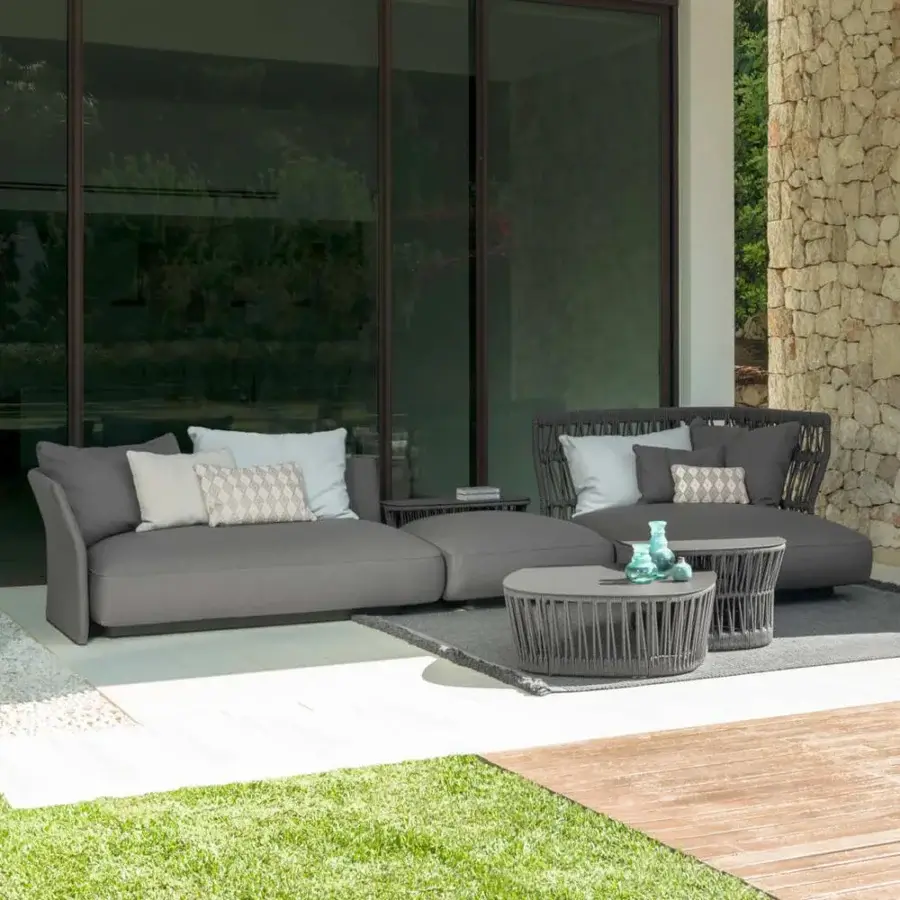 Distinguished Talenti Cliff sectional with weather-resistant fabrics and woven detailing presenting a soft matte finish
