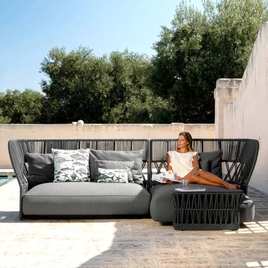 Sophisticated Talenti Cliff sectional with cool gray weather-resistant fabrics and refined synthetic nautical rope armrests