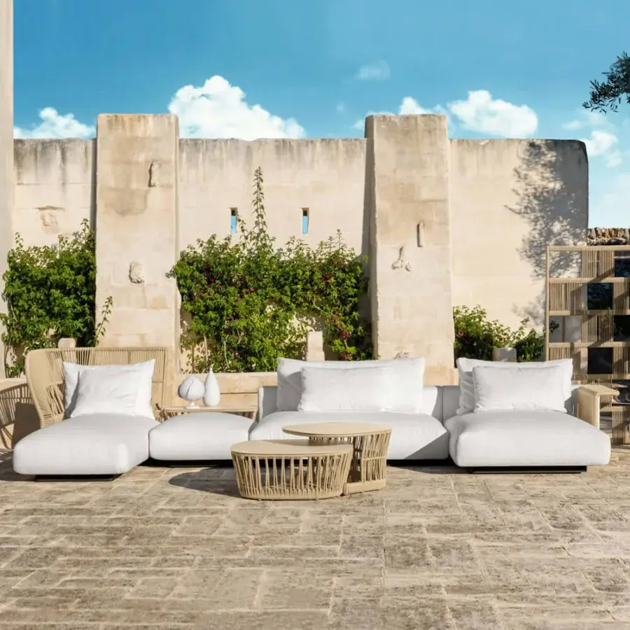 Sophisticated Talenti Cliff Déco sectional in white outdoor fabric with refined aluminum armrests and nautical rope detailing