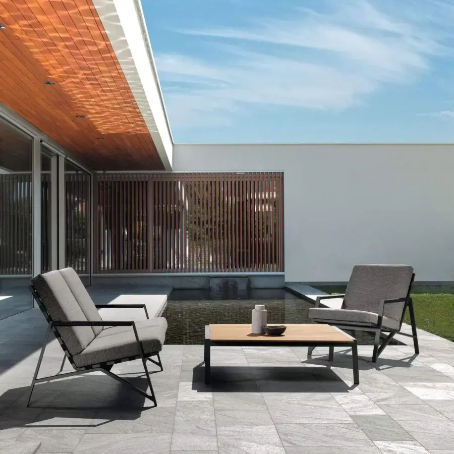 Elegant Talenti Cottage sofa with aluminum frame, gray textile cushions and rope detailing on armrests