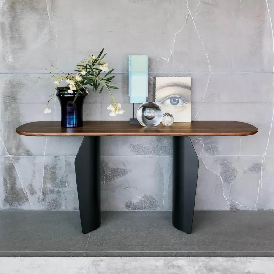 Elegant Bonaldo Flame console with sinuous dark matte metal base and medium brown wood top crafted in Italy