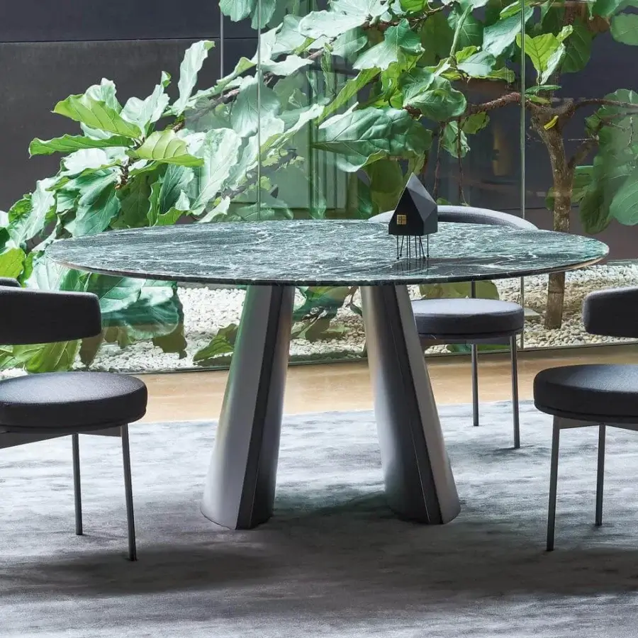 Elegant Bonaldo Torii table with green marble top displaying white veining and matte gray metal base crafted with lighter gray details