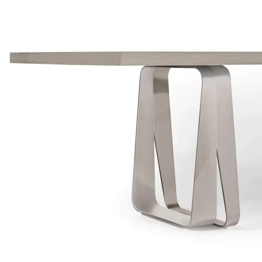 Distinctive Costantini Pietro Bend table with light gray wood-like top and looped neutral metallic satin finish legs