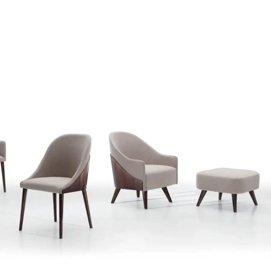 Distinguished Costantini Pietro Shell chair crafted in Italy with light gray upholstery and matte wood shell with dark brown legs