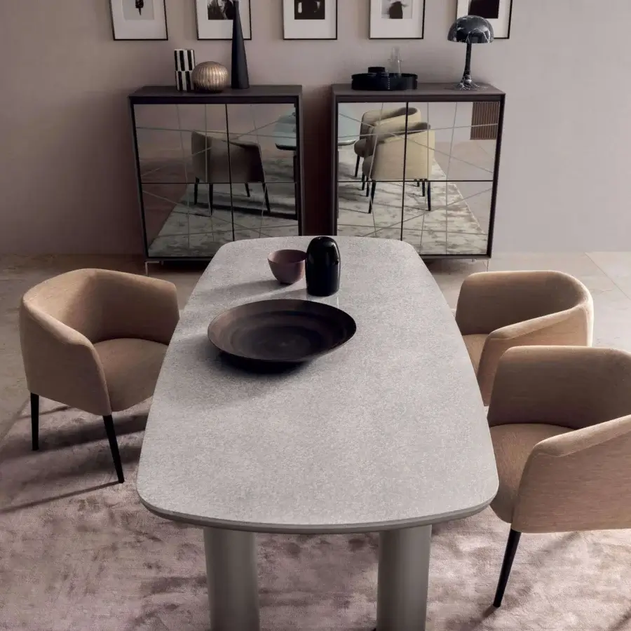 Distinguished Presotto Kolosso table with a rounded rectangular tabletop in speckled light gray and black matt lacquered metal legs
