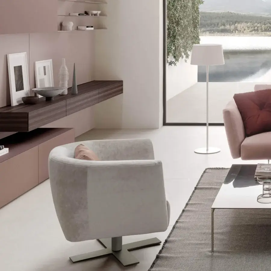 Elegant Presotto Saint Barth lounge chair with removable light grey fabric and refined Peltro finish swivel base