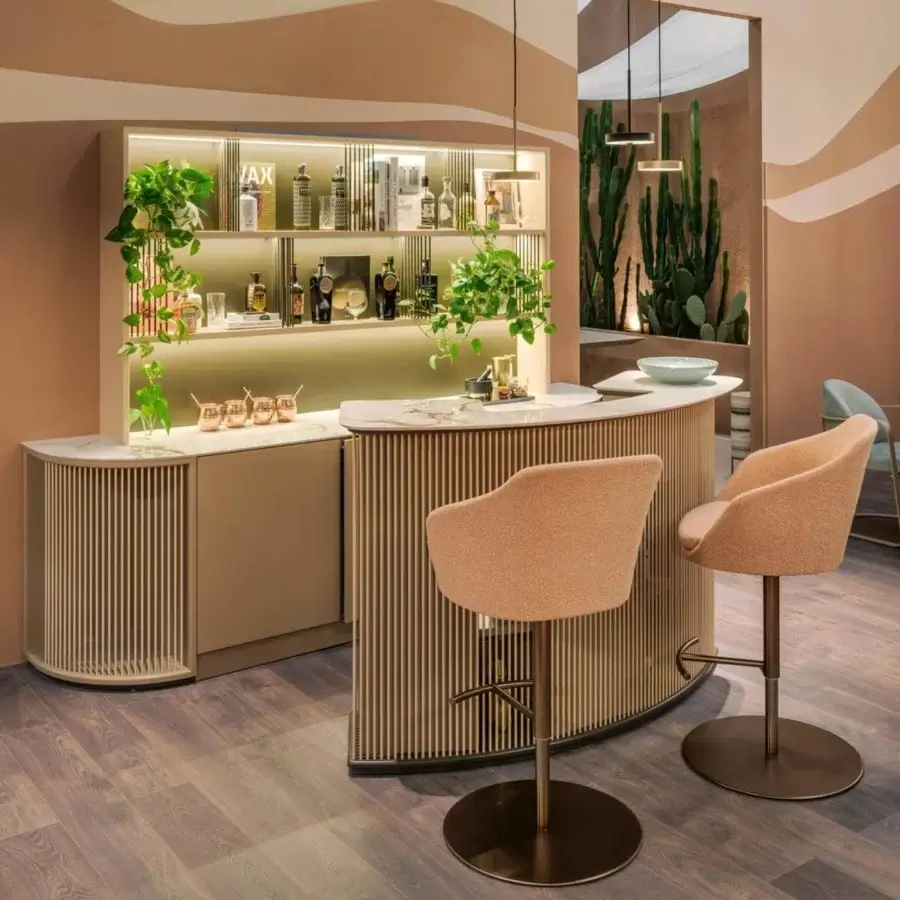 Sophisticated Vismara Dry Bar wall unit and counter with light tan lacquered finish, marble countertop, and illuminated shelving
