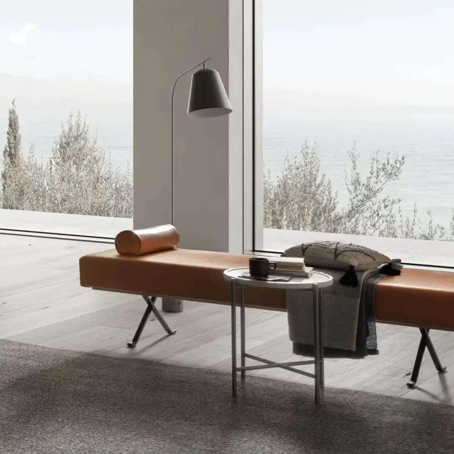 Distinguished Presotto Dormeuse chaise lounge crafted in smooth brown vegetable tanned leather with matt black painted metal legs