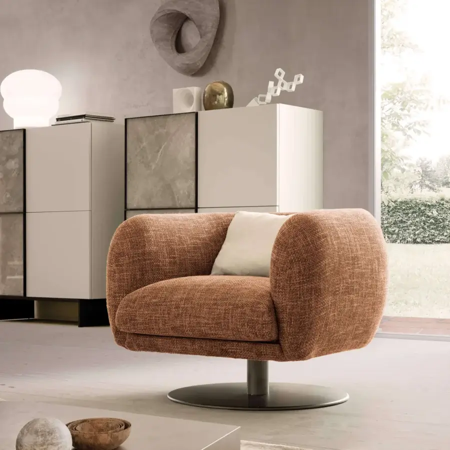 Luxury Presotto Bali lounge chair with warm brown textured textile upholstery and Peltro painted base