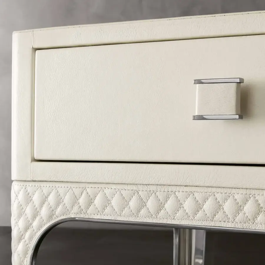 Distinguished Rugiano Charlie nightstand with cream leather and quilted matelassè embroidery, built with sleek steel details