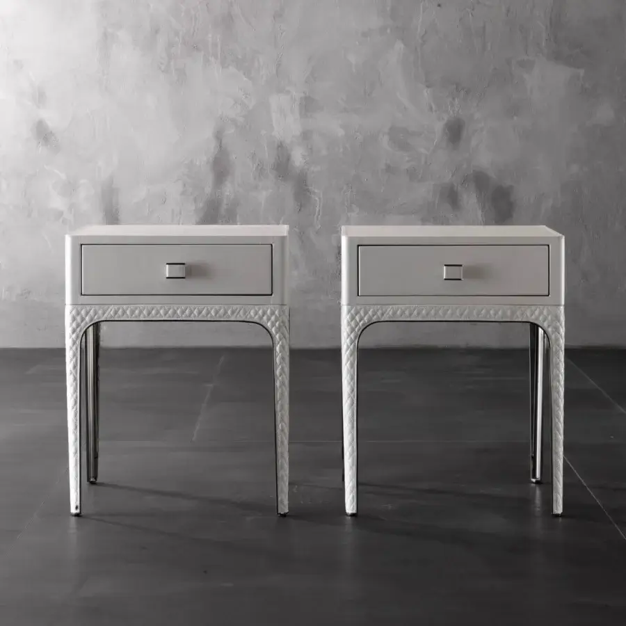 Elegant Rugiano Charlie nightstand in light gray quilted leather with sleek metal details and refined matelassé embroidery