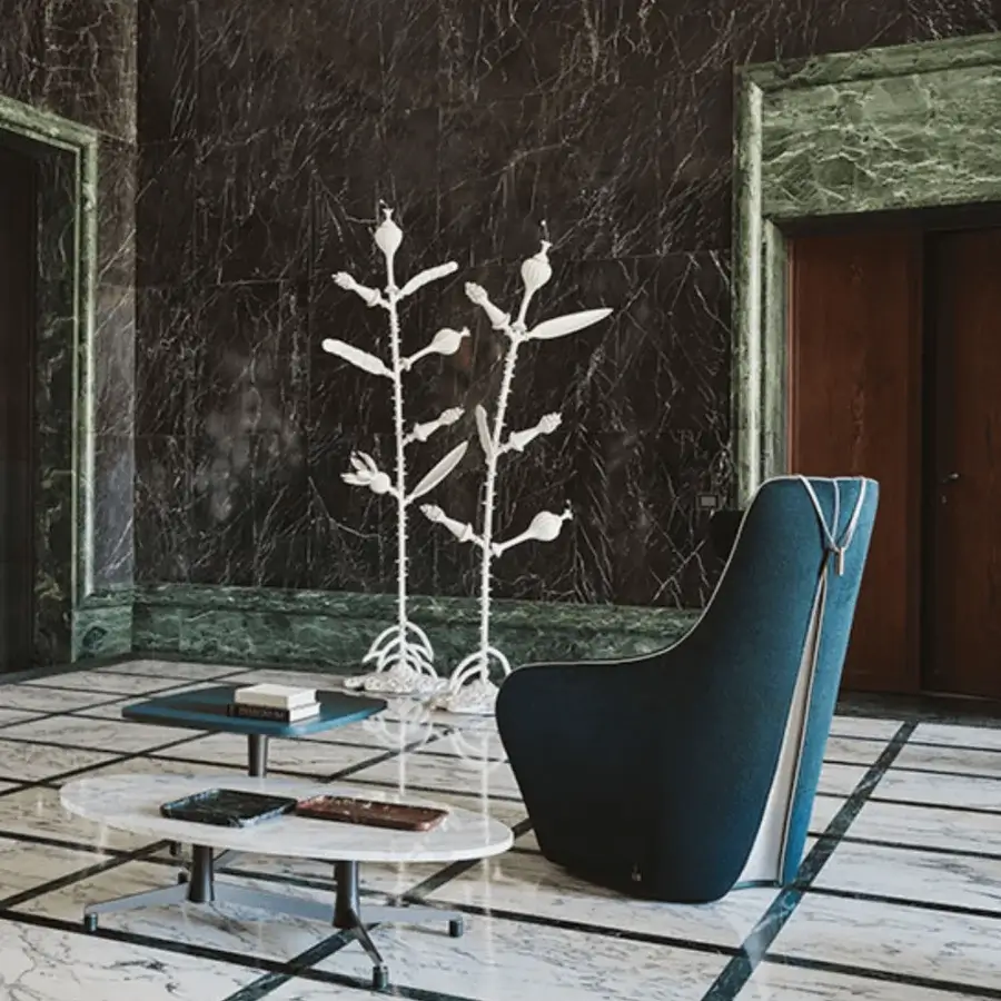 Superior Giorgetti Tie XL lounge chair upholstered in dark blue textile with lighter bordering and solid ash wood base